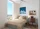 furnished bedroom with a study desk